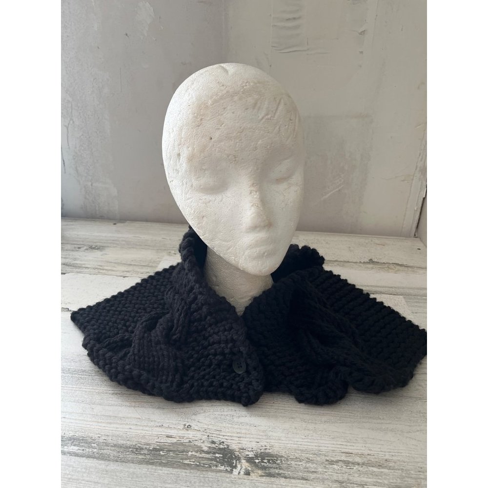 Black knitted or crocheted button front winter collar